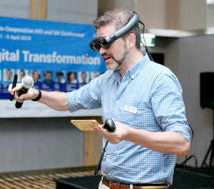 Man giving a VR presentation at a tradeshow
